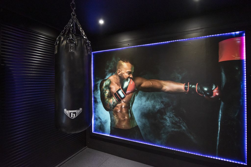 Private gym boxing corner with Hatton punch bag. 