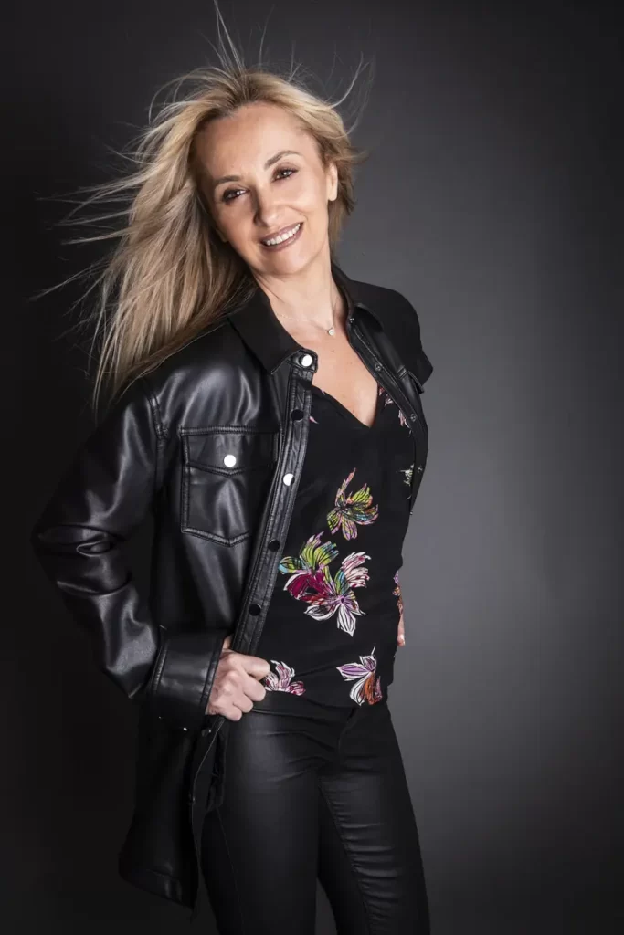 Female personal trainer in Bromley lifestyle portrait smiling in professional fitness branding photo